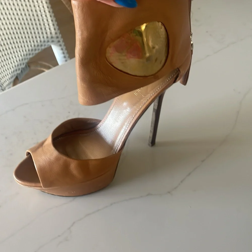 Sergio Rossi stunning tan